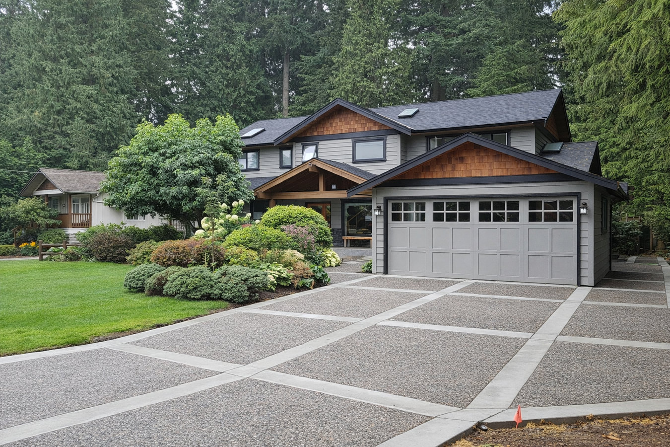 Professional concrete contractor pouring a driveway in Springfield, MA